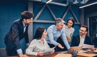 Team of professional discussing new project in office
